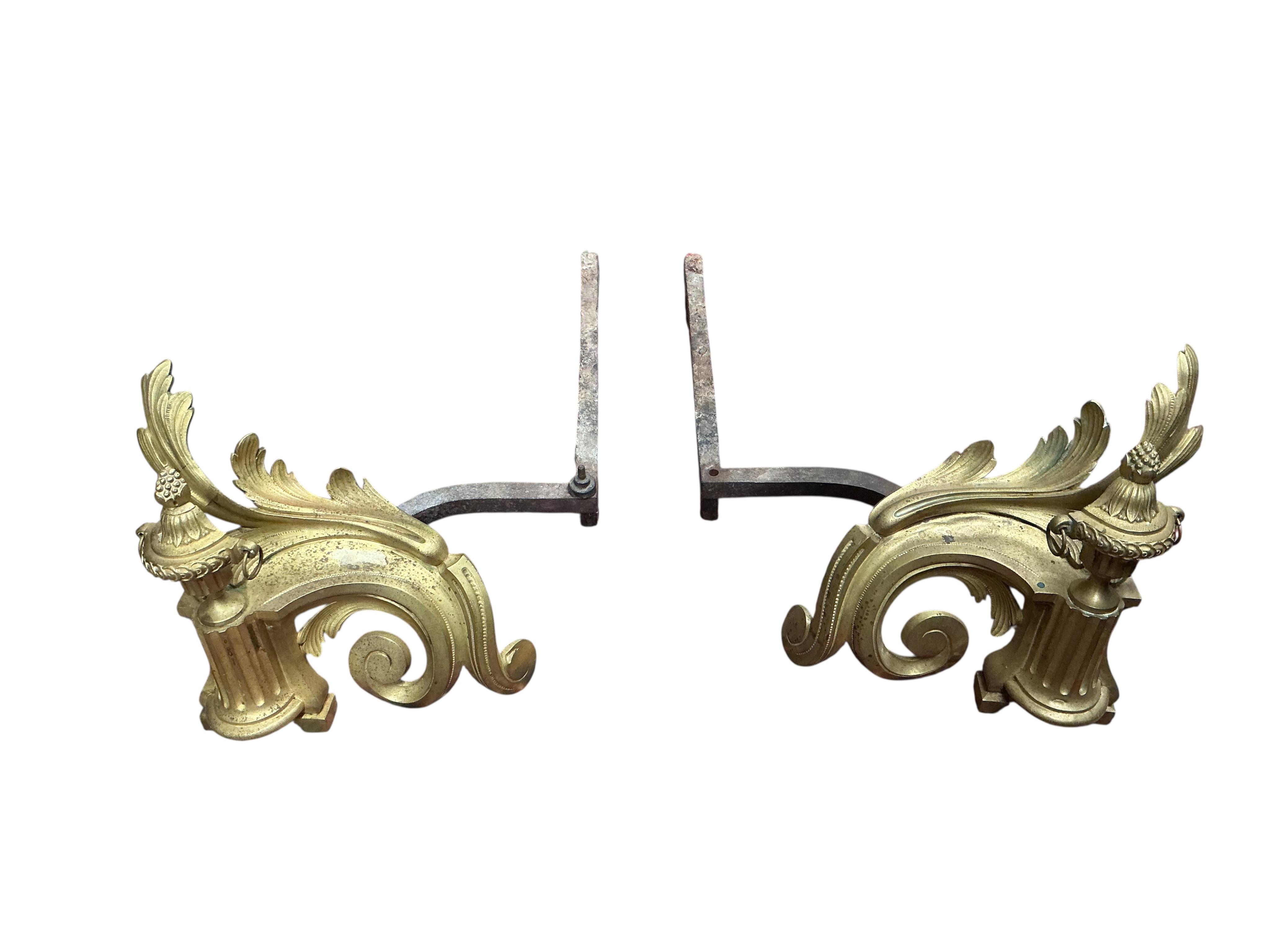 A pair of brass chenet